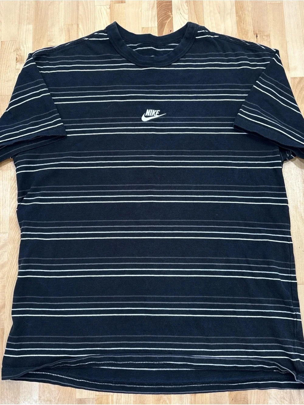 Nike Men’s Black Tee with White Stripes and Embroidered Logo